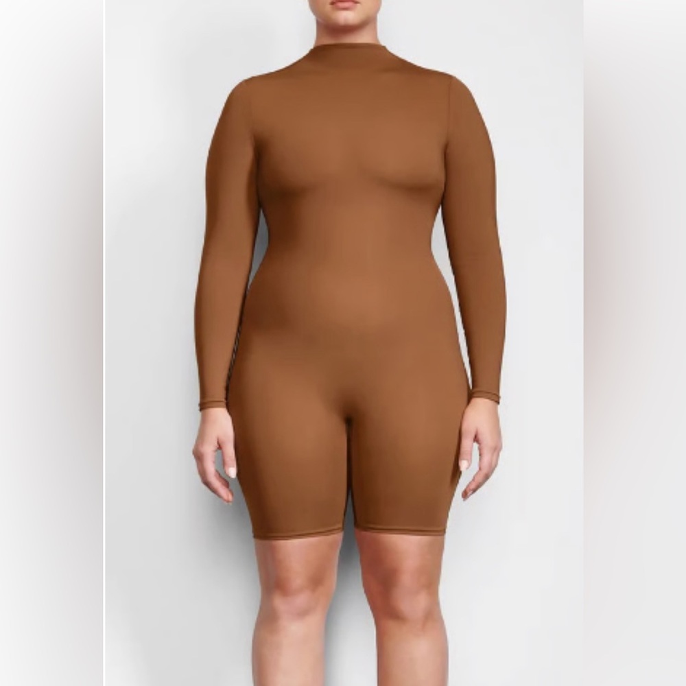 NWT Skims ALL-IN-ONE LONG SLEEVE MID THIGH ONESIE
